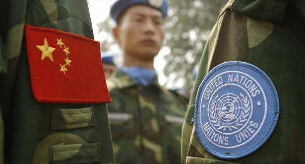 Close up of soldier clothes with China and UN flags