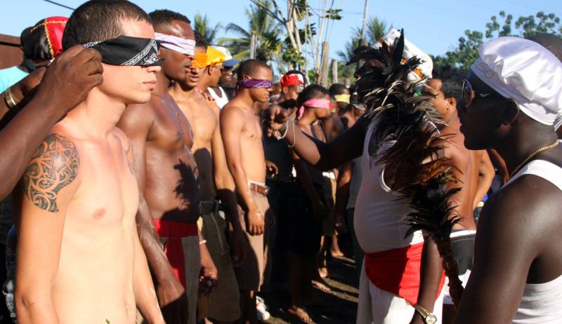 Young men with blindfolds