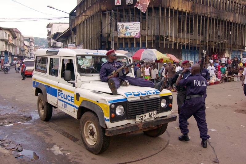Policemen and a police car in the streets