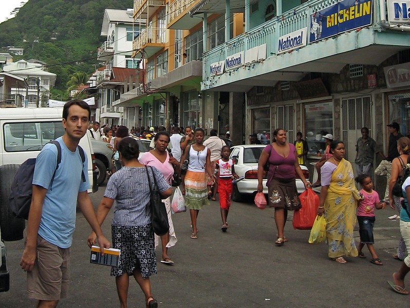 People on the street in Victoria, capital of Seychelles.