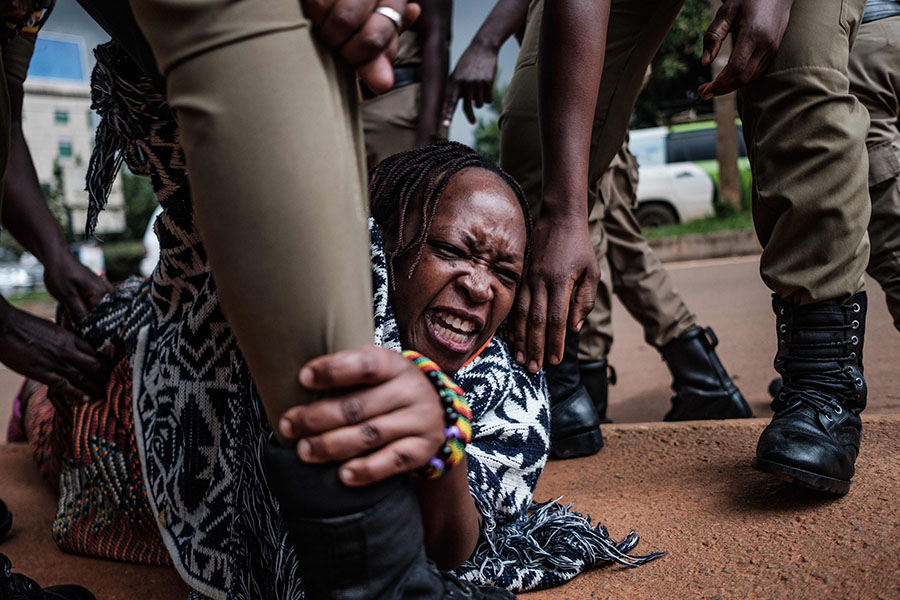 Kampala, 18 May 2020. Ugandan scholar and activist Stella Nyanzi arrested by police officers as she organised a protest. Photo Sumy Sadurni, AFP.