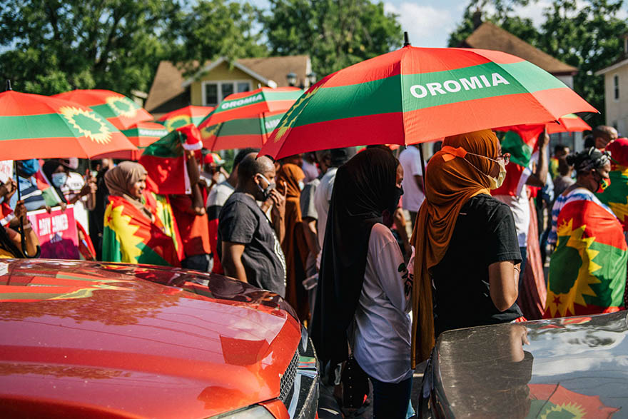 Members of the Oromo community march in protest after the death of musician and revolutionary Hachalu Hundessa in St. Paul, Minnesota.