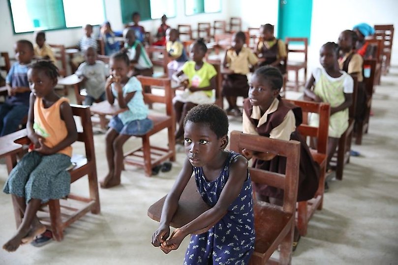 Children sitting in a class room in Beajah Liberia, listening