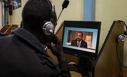 An Ethiopian streams a video of Prime Minister Abiy Ahmed speaking, at an internet cafe in the capital Addis Ababa, Ethiopia Thursday, Nov. 26, 2020. Photo: Samuel Habtab/AP